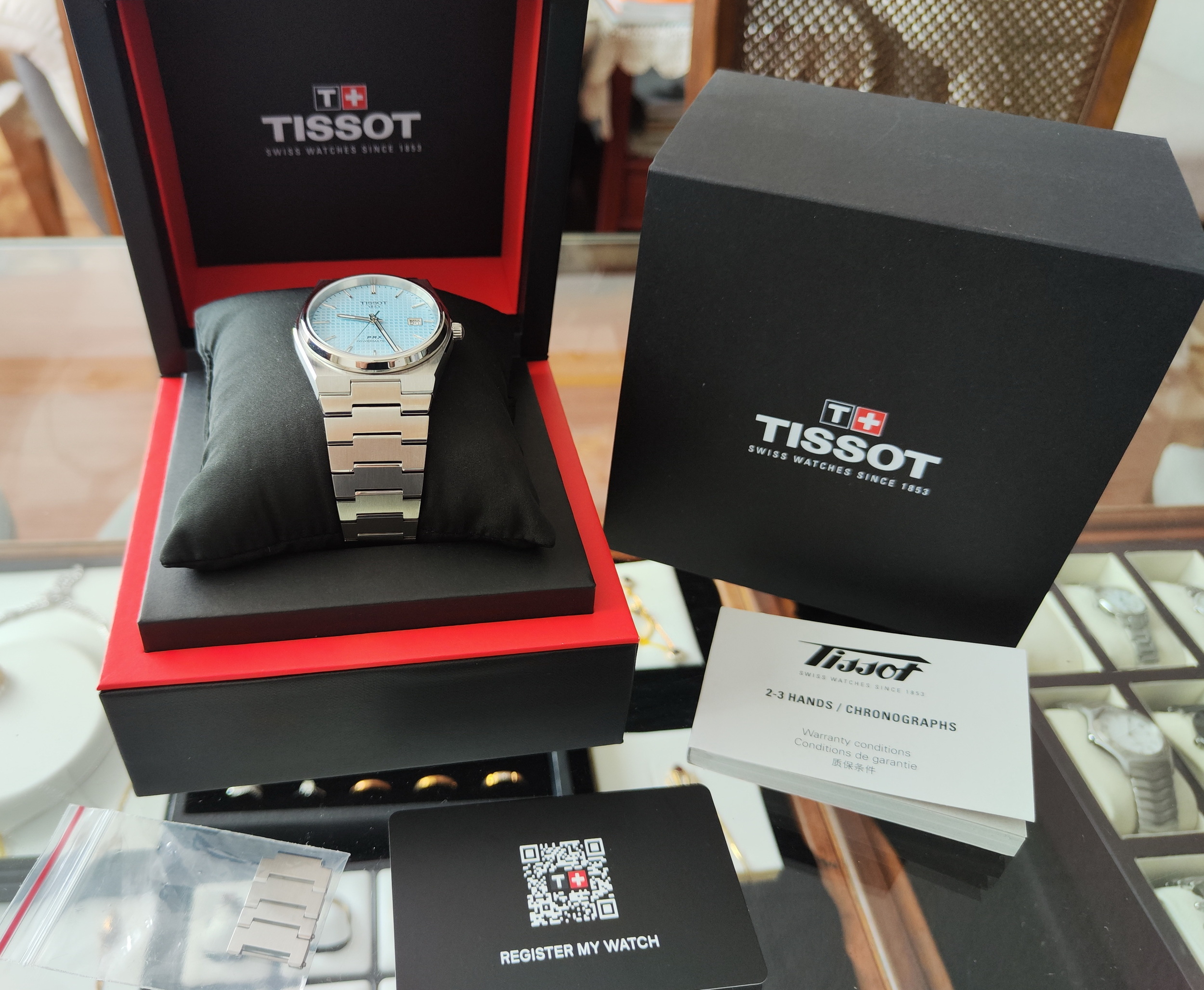 TISSOT 天梭 PRX系列 冰藍面盤 錶徑40mm 自動上鍊~原廠盒單 2025AD 11