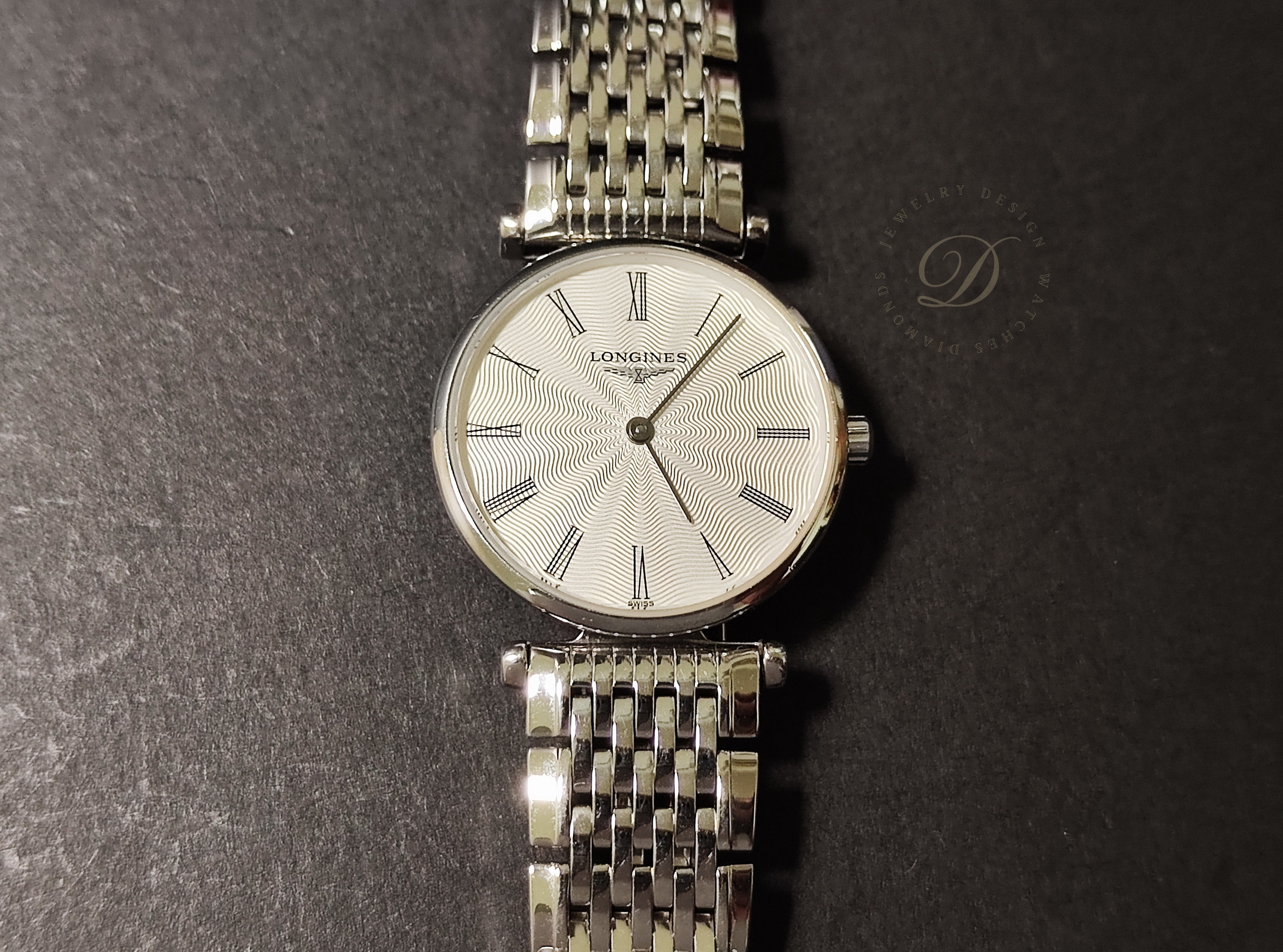 浪琴 嘉嵐系列  銀白色波紋面盤 錶徑24mm 羅馬數字 石英機芯 LADY'S