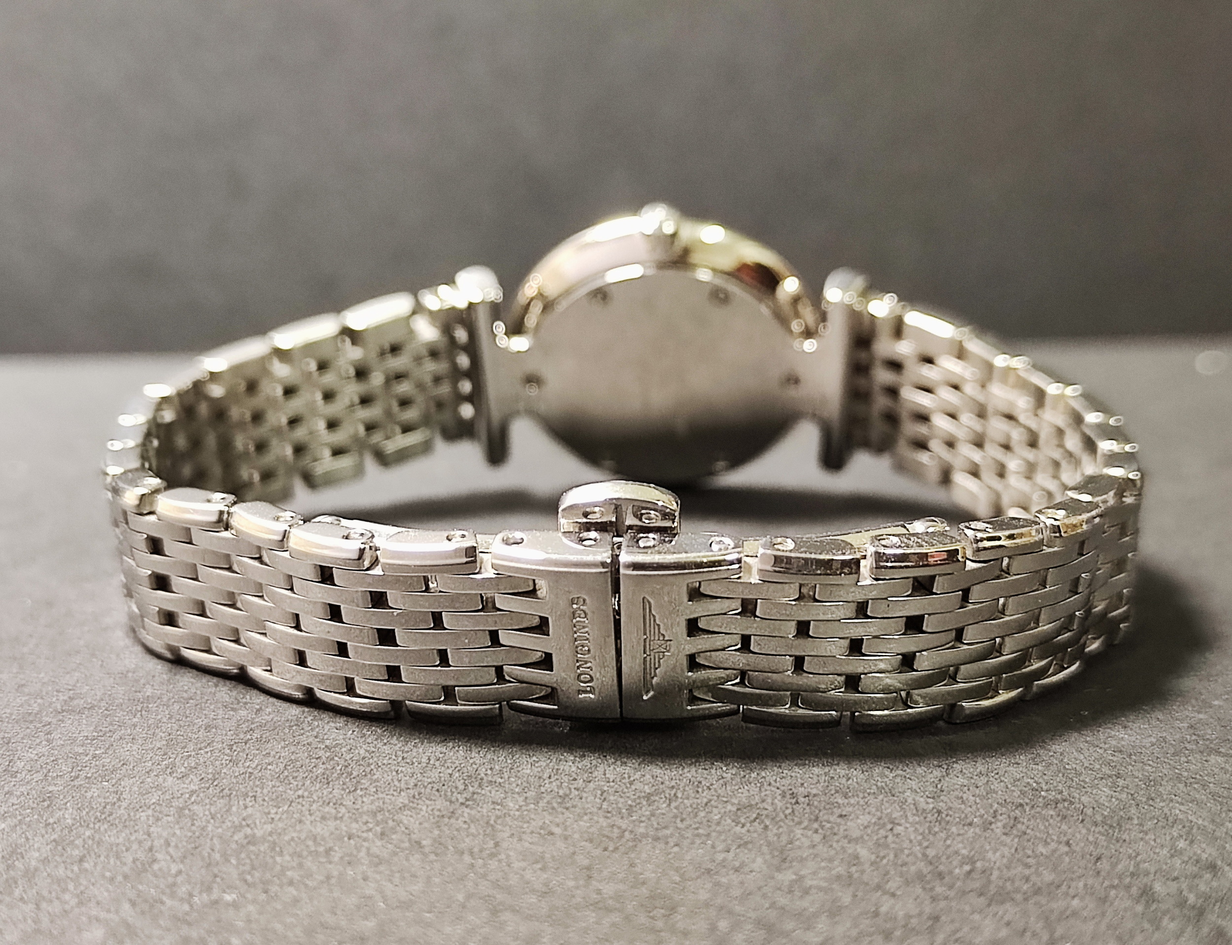 浪琴 嘉嵐系列 原鑲鑽圈 白色面盤 錶徑24mm 羅馬數字 石英機芯 LADY'S 6